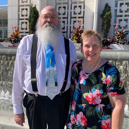 Kevin and Leslie Twitchell outside an LDS temple