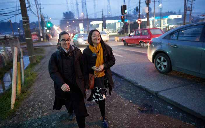 Sister missionaries enjoy a night sharing the gospel.