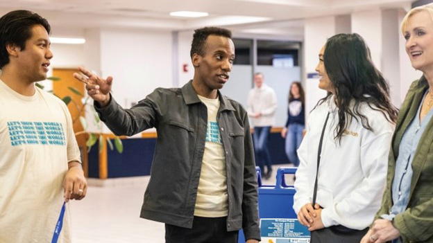 BYU Student Body President Fritz-Carl Morlant speak with BYU students in the Wilk