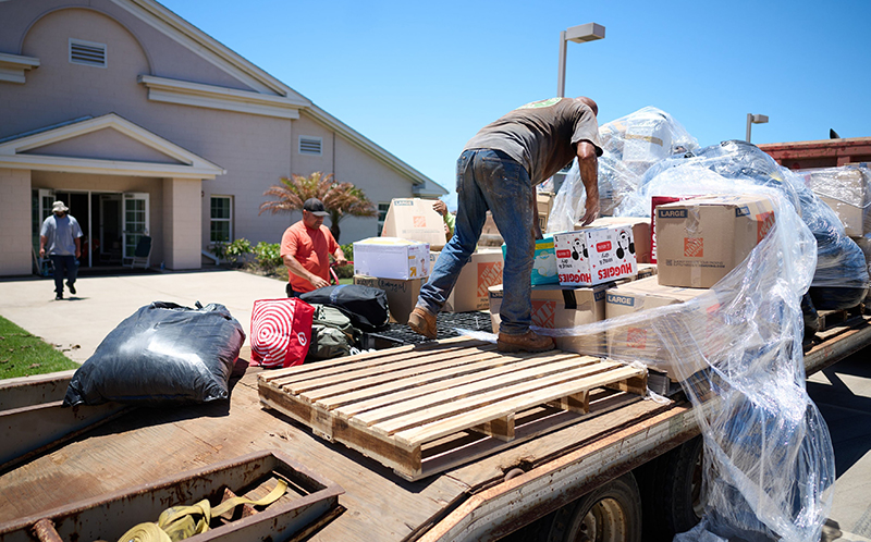 Man delivering supplies to help with the Maui wildfires