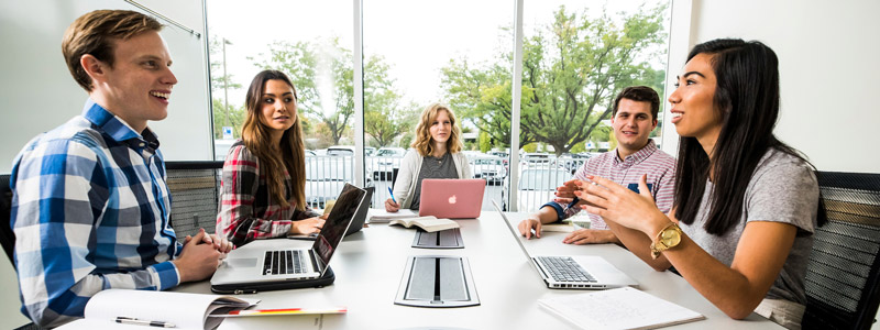 Group of BYU business students studying together