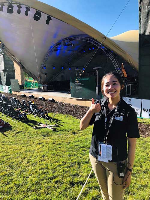 woman standing in front of the stage at Deer Valley Musici Festival