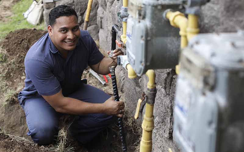 man working on pipes