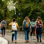 Group of students walking together to class.