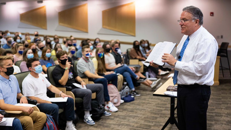 Male BYU religion professor teaching a class.