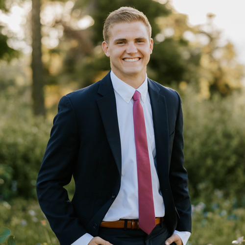 Michael Merrill in a suit outdoors